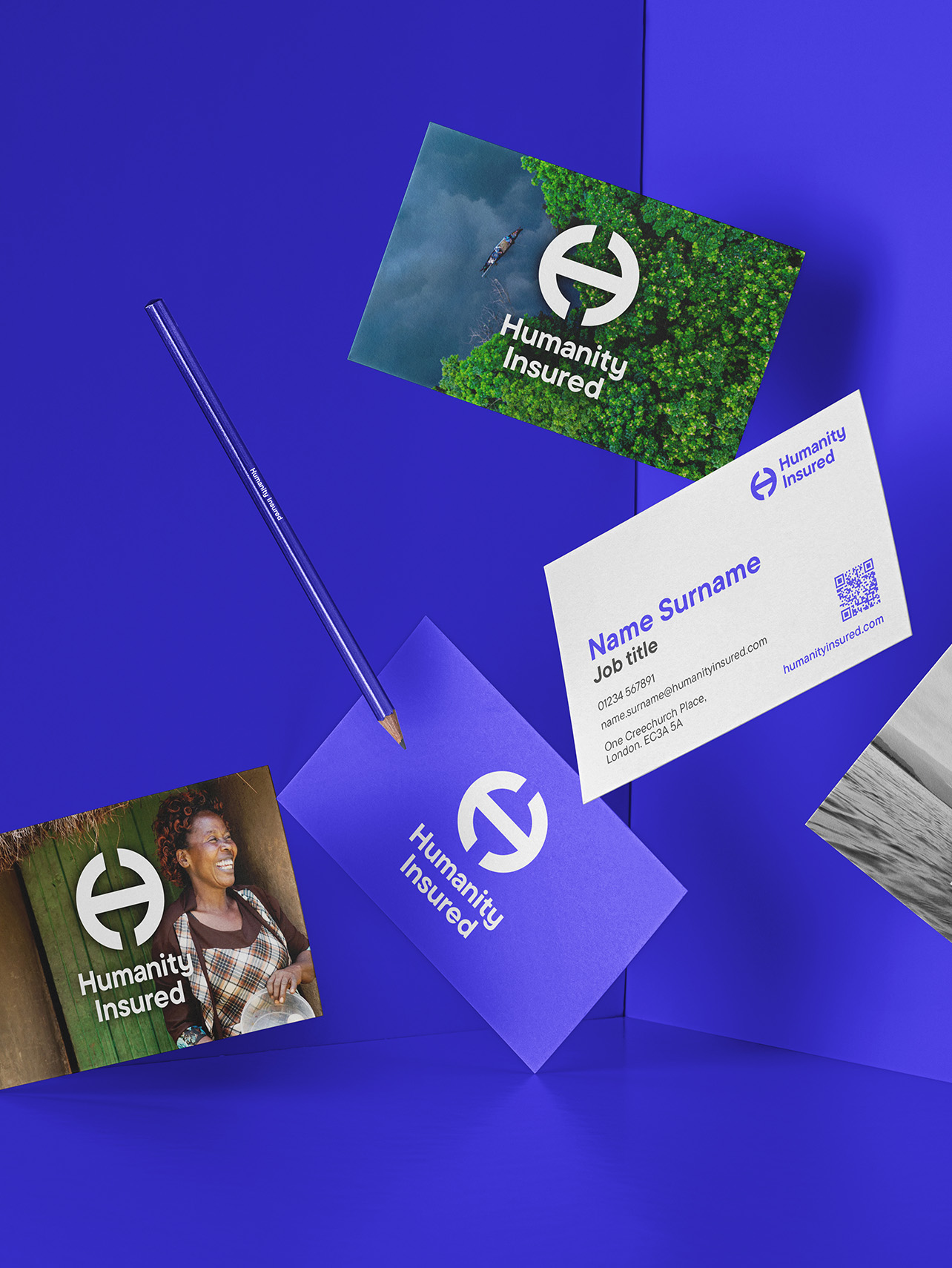 A mockup of Humanity Insured business cards